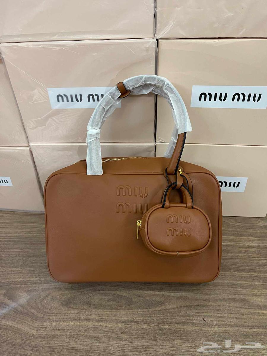 شنط تقليد ماركه ميو ميو و ماركة قوتشي64593301136898111