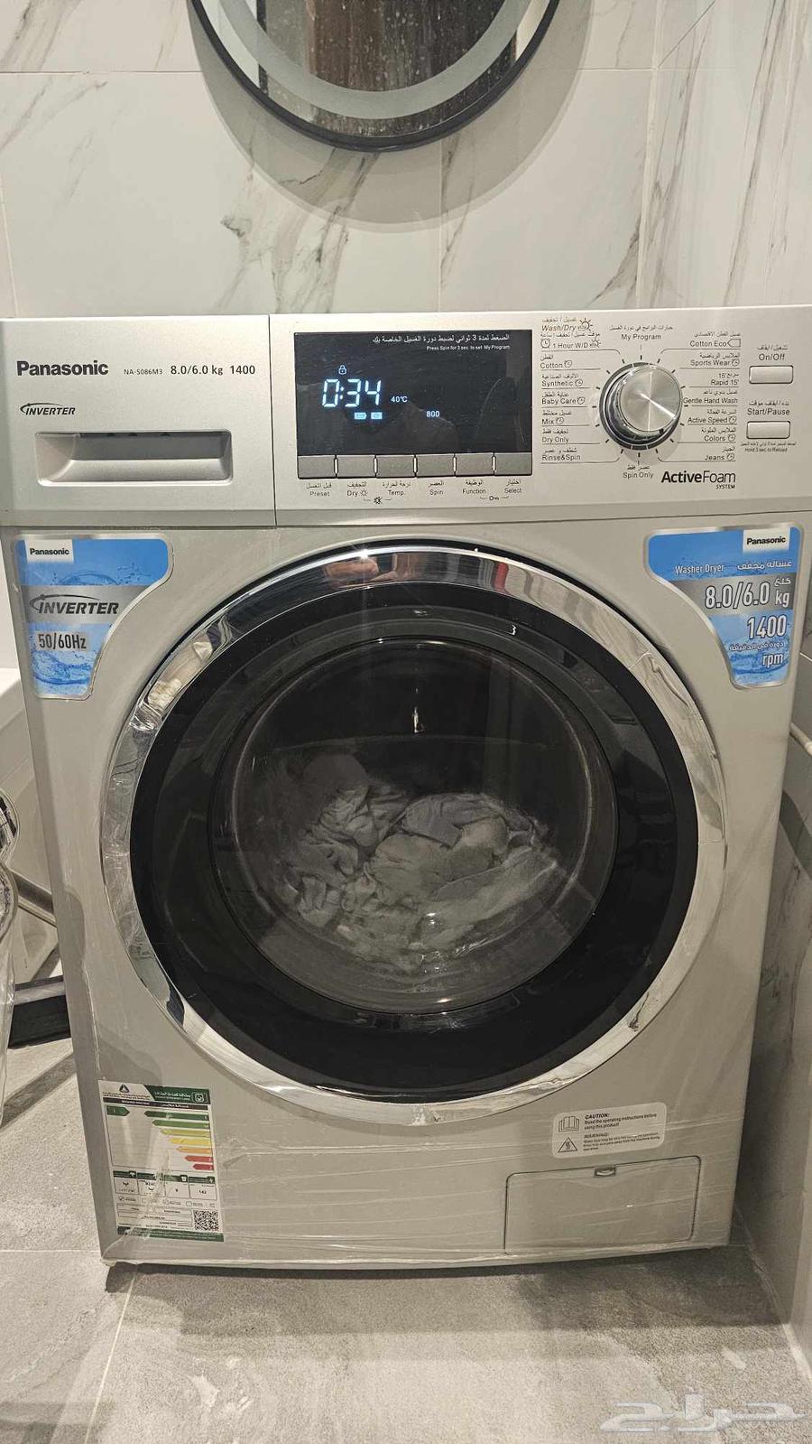 غسالة ونشافة باناسونيك ( غسيل 8 كيلو   تنشيف 6 كيلو)64610579765122112