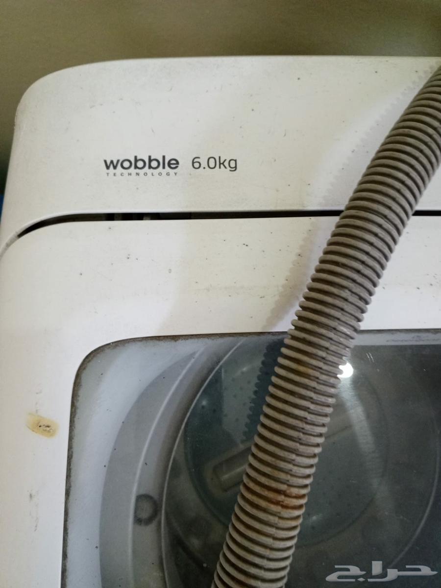 غسالة وطاولة مكتب64607941461762112