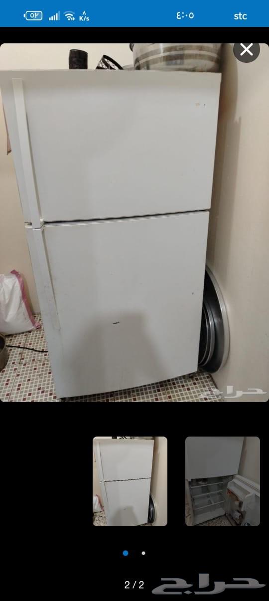 A navy-blue sofa from Home Box that converts into a bed with an internal storage box64614782284418112