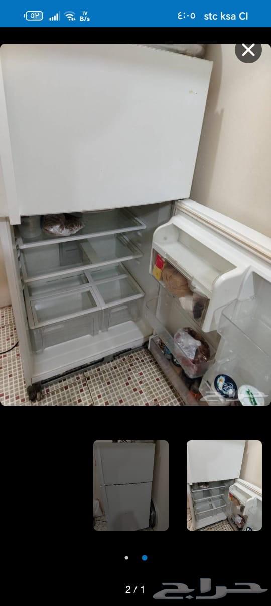 A navy-blue sofa from Home Box that converts into a bed with an internal storage box64614782284418113