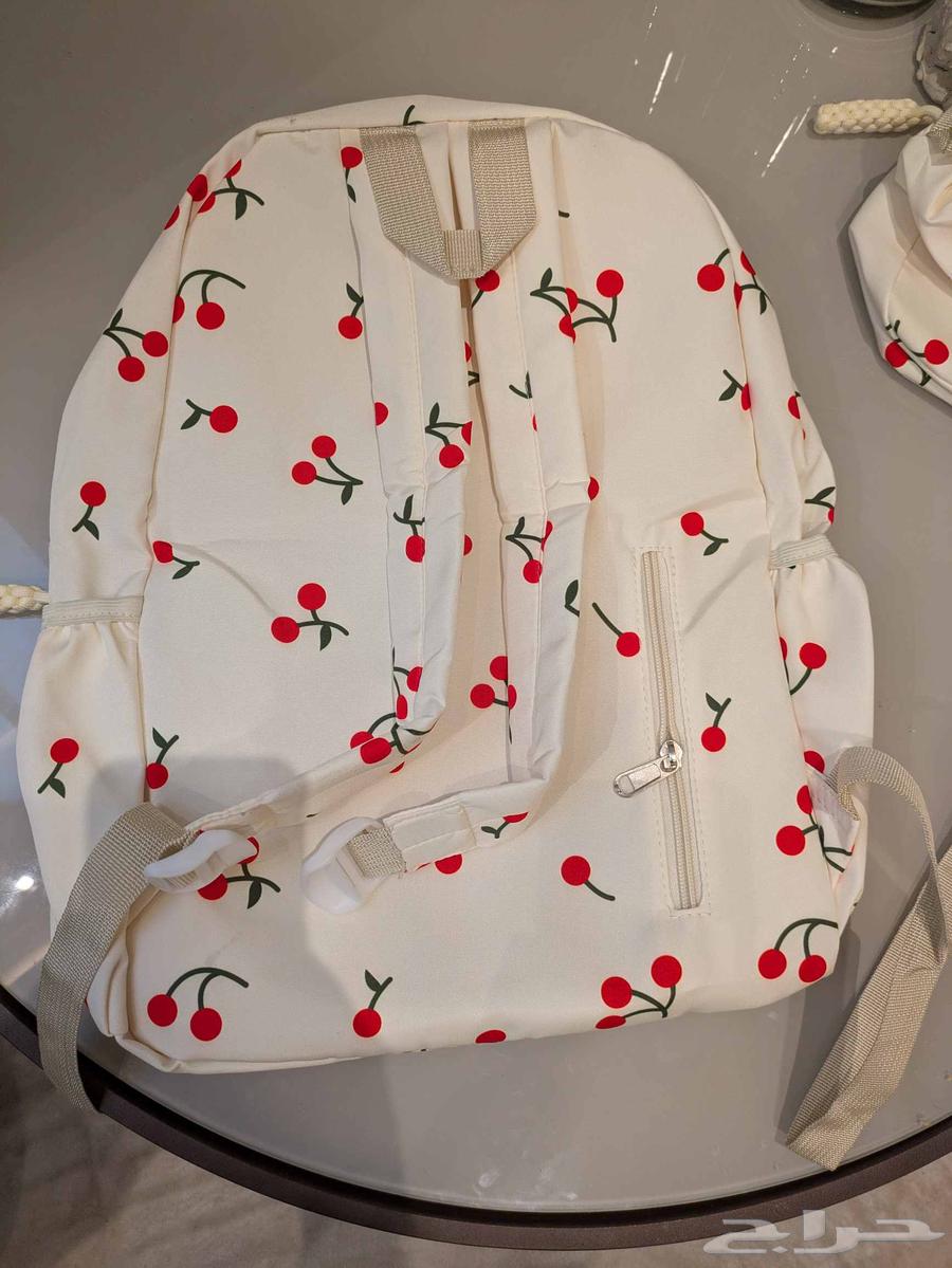 A distinctive new school bag with the name (Amal) written on it64416187929859114