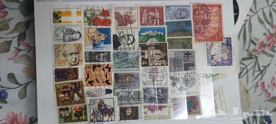 ألبوم طوابع بريدية.ممتلئ بالطوابع64413864901251114