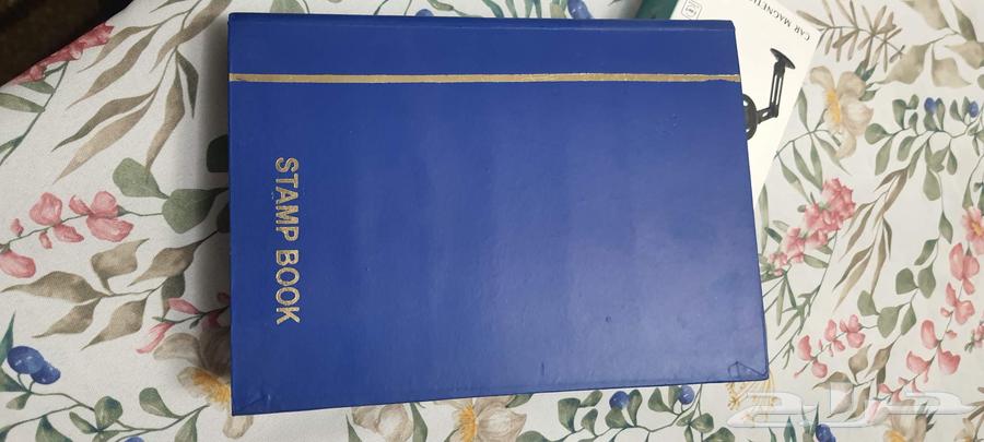 ألبوم طوابع بريدية.ممتلئ بالطوابع64413864901251110