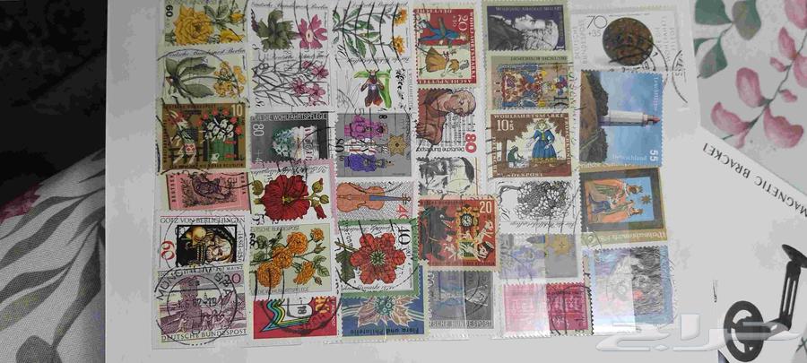 ألبوم طوابع بريدية.ممتلئ بالطوابع64413864901251112