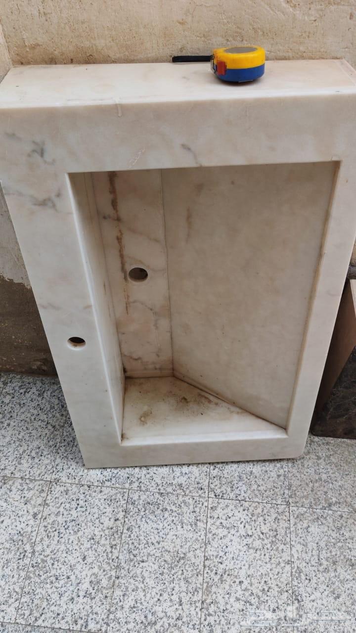 Exhibition of marble sinks, waterjet panel, and marble slab64415692714754112