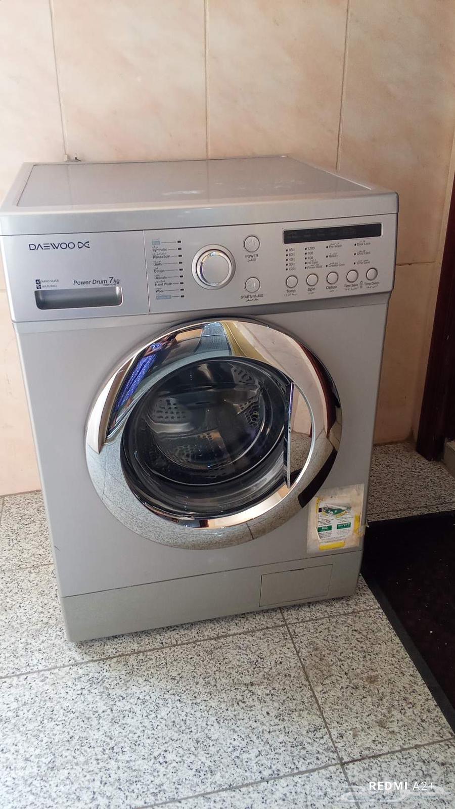 غسالة بحالة جيدة جدا بس فيها مشكلة بالقطعه الصغيرة تبع الباب64413193970307110