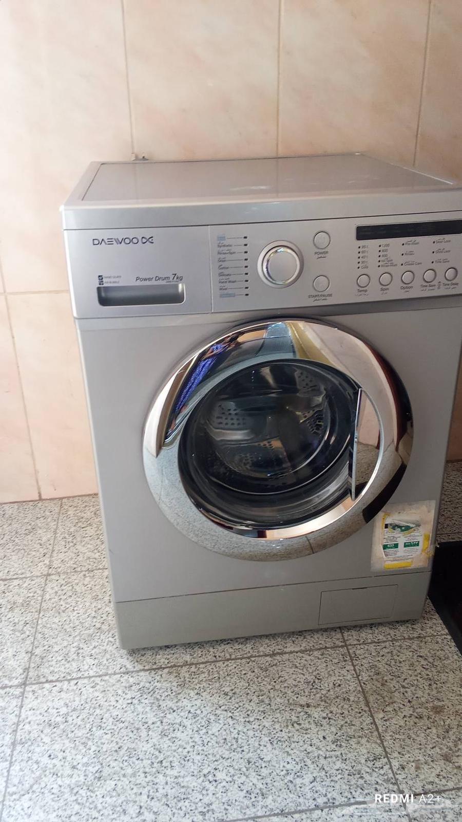 غسالة بحالة جيدة جدا بس فيها مشكلة بالقطعه الصغيرة تبع الباب64413193970307111