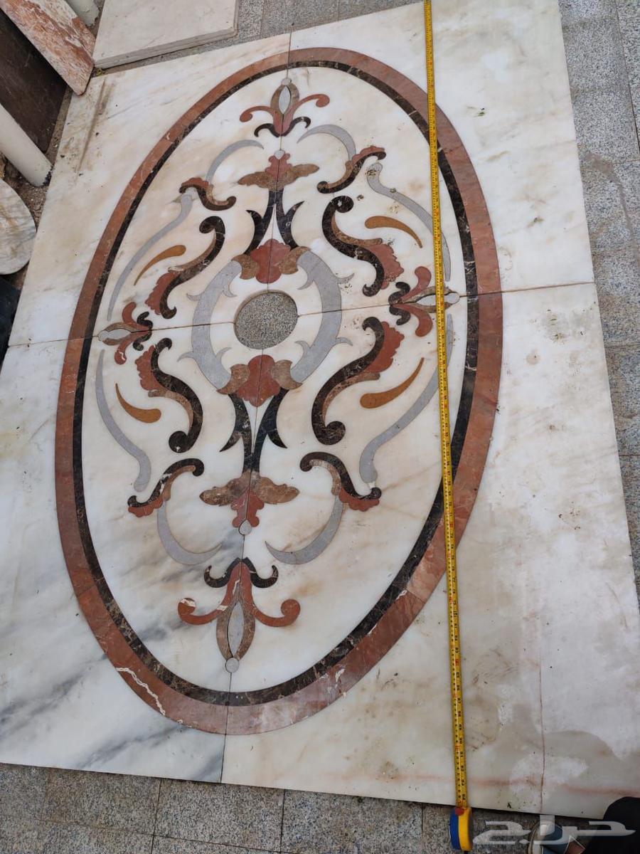 Exhibition of marble sinks, waterjet panel, and marble slab64415692714754110