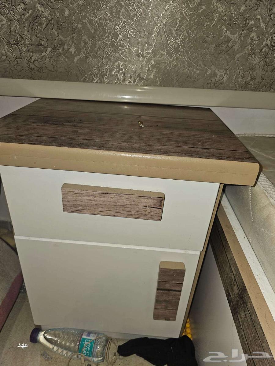 There is a new traditional bedroom with new bedding, oven, gas cylinder, and washing machine64424078921474112