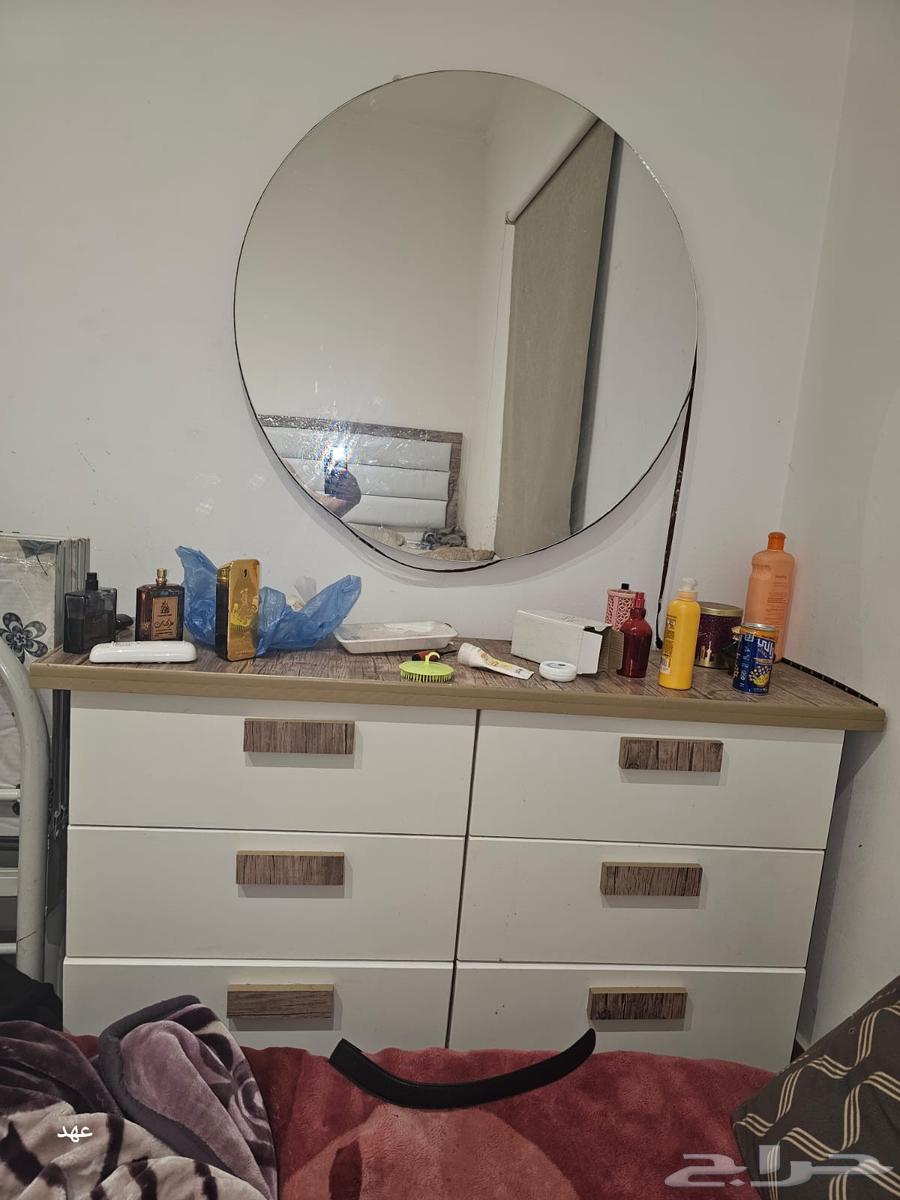 There is a new traditional bedroom with new bedding, oven, gas cylinder, and washing machine64424078921474113