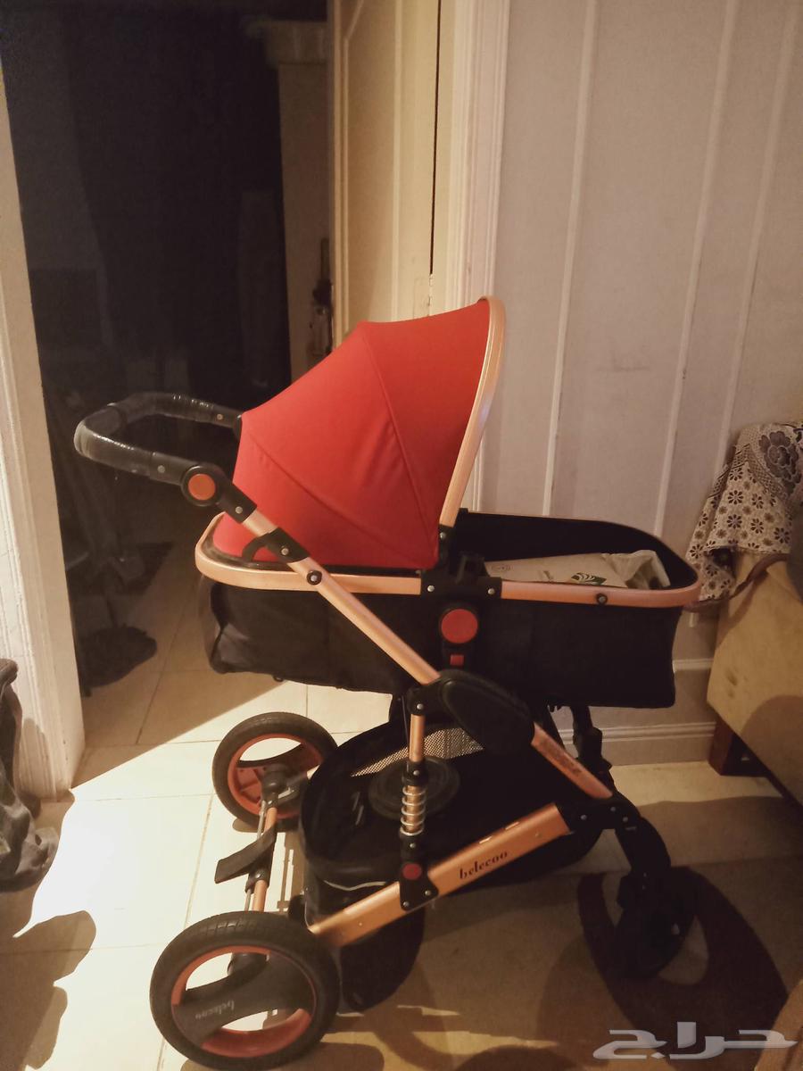 سرير اطفال خشب حاله ممتازه و وعجله اطفال حاله ممتازه ب 30064419878846466112