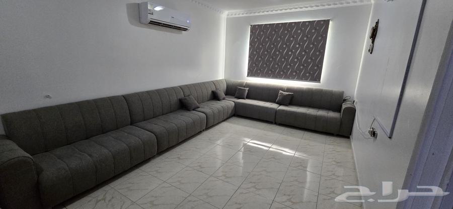 Sofa, tables, and curtain64420702128387111