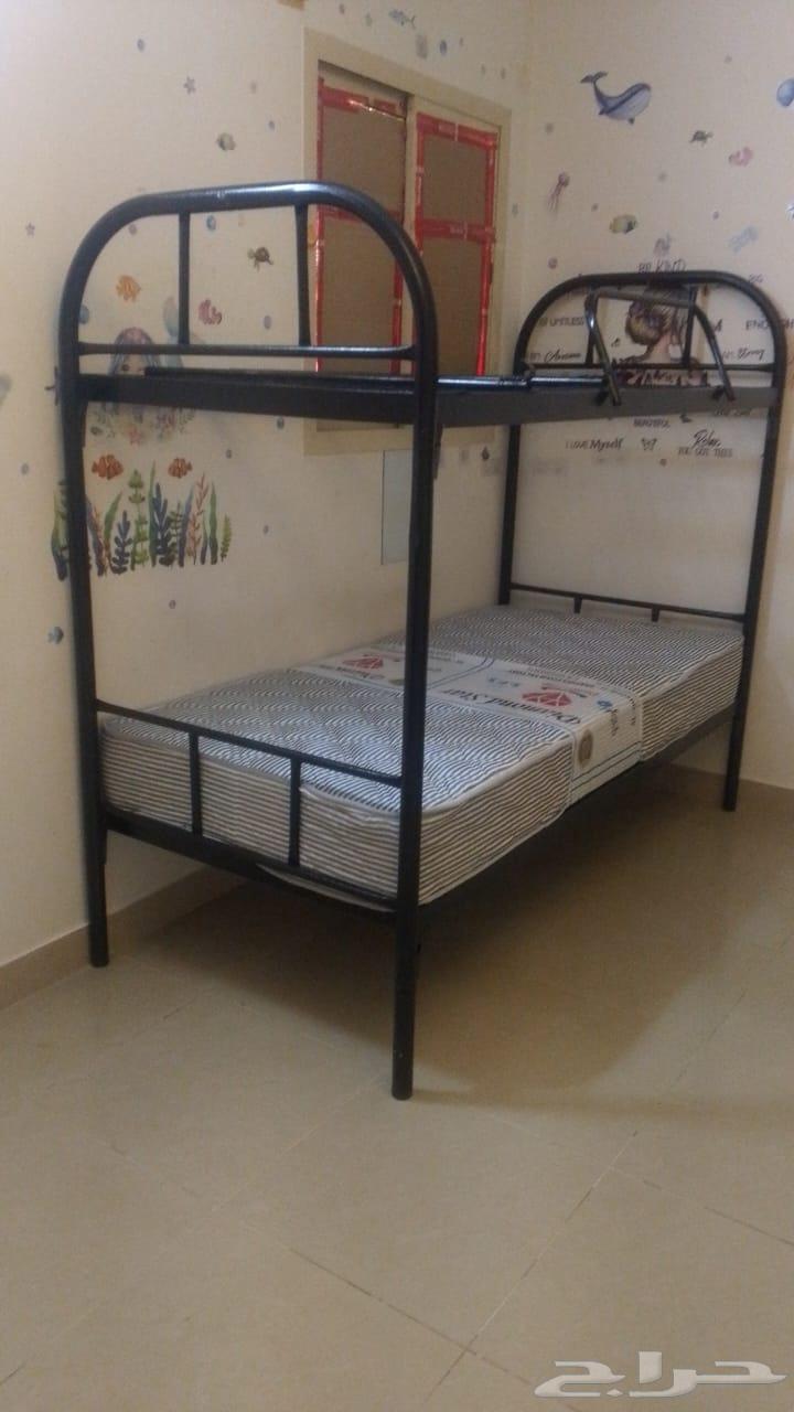 Double and single iron bunk bed with mattresses, blankets, and pillows new64421053589121110