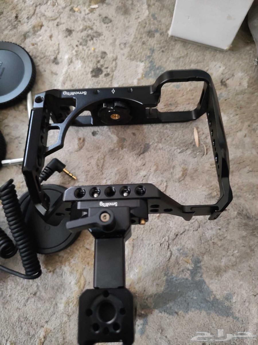 حامل قفص كاميرات بالمقبض اليد و غطاء عدسات كاميرات وشاحن64427569664642112