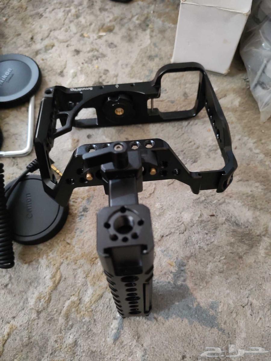 حامل قفص كاميرات بالمقبض اليد و غطاء عدسات كاميرات وشاحن64427569664642114