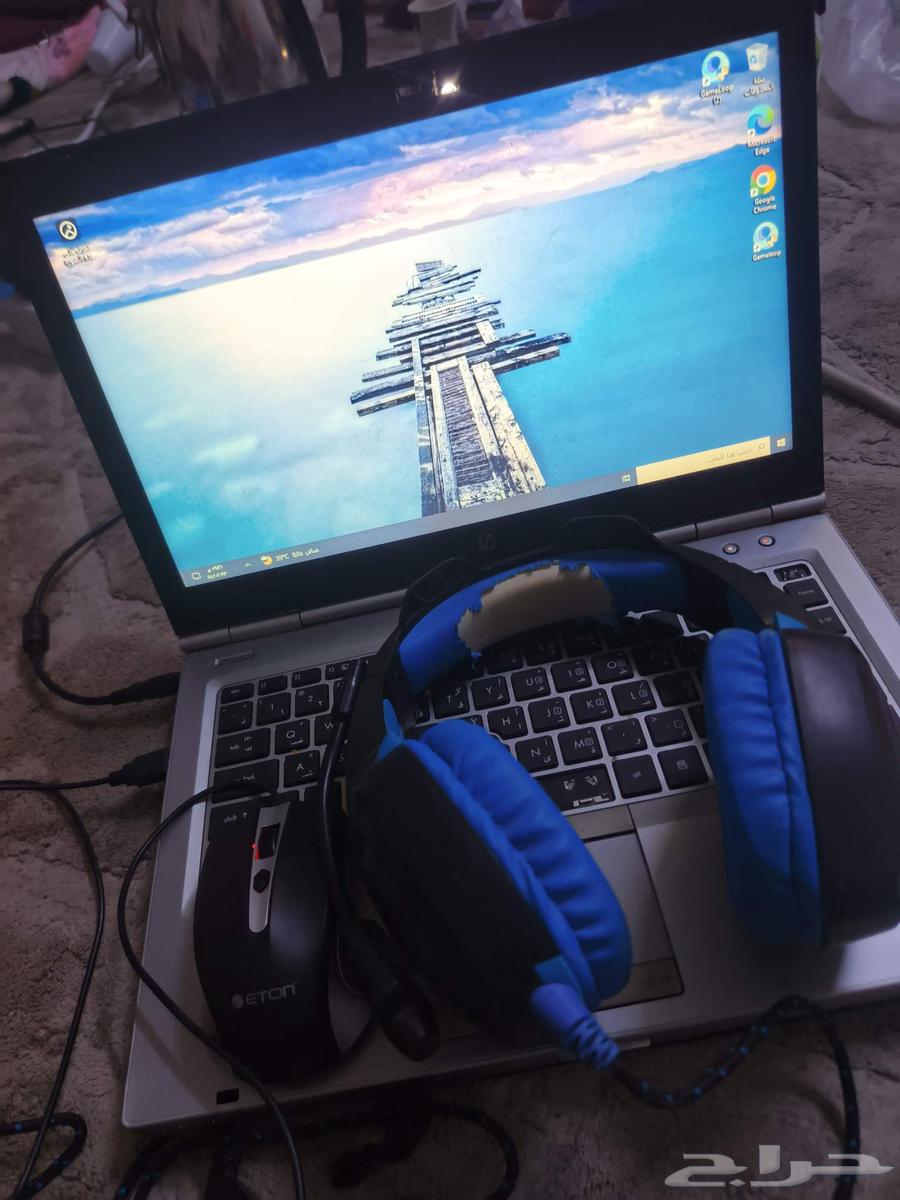 Laptop DESKTOP-AQ7ITSN with ONIKUMA headphones, the device is clean64440015918595110