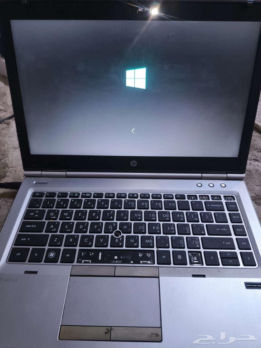 Laptop DESKTOP-AQ7ITSN with ONIKUMA headphones, the device is clean64440015918595114