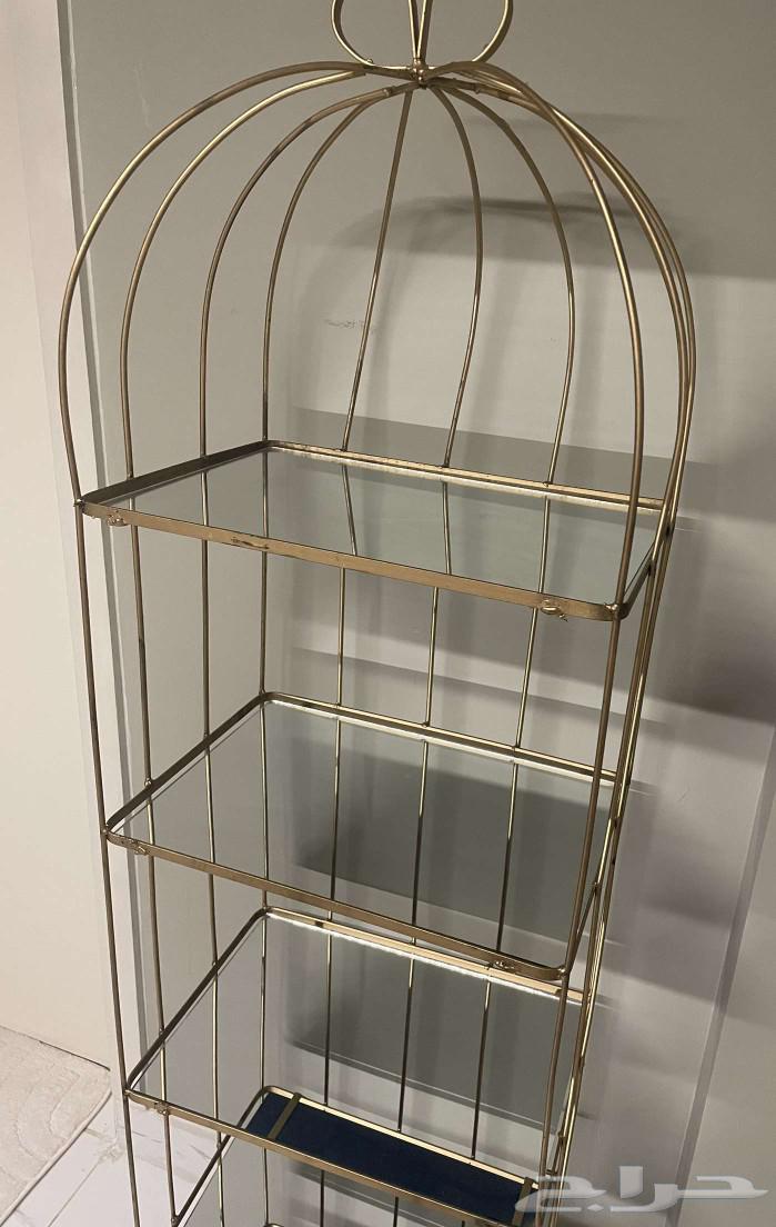 Half-body mannequin with one golden design and the other an iron shelf stand64448766791426110