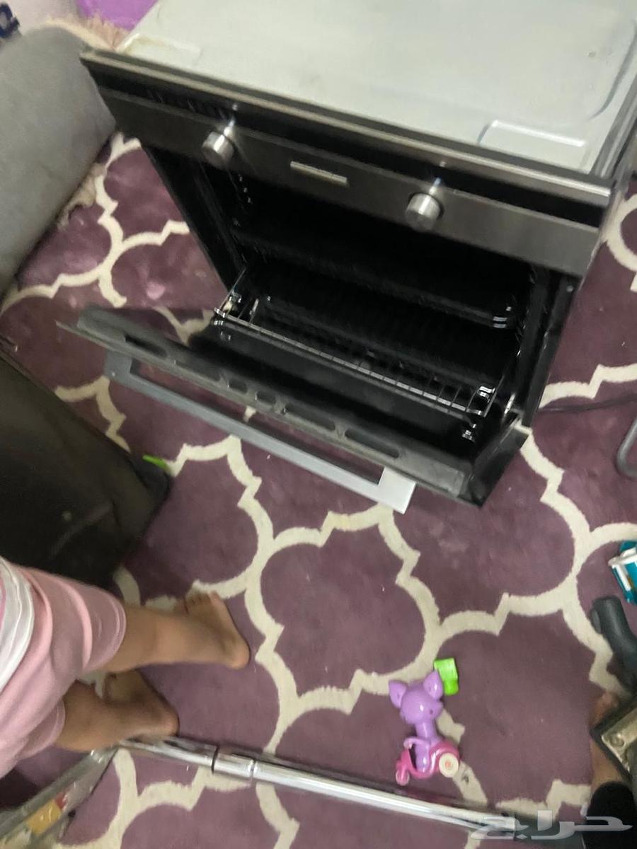 Almost new microwave and electric oven without any defects64442529571841112