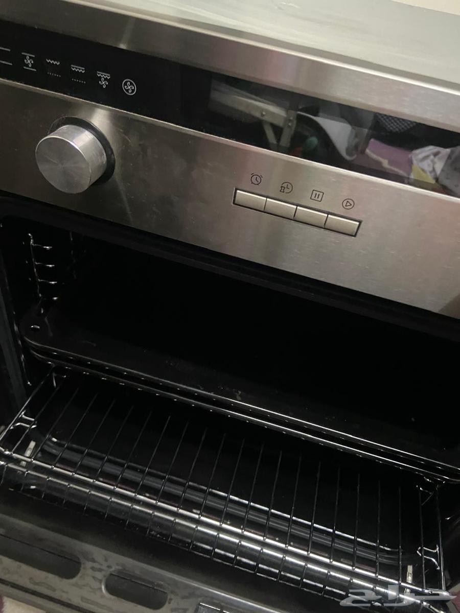 Almost new microwave and electric oven without any defects64442529571841110