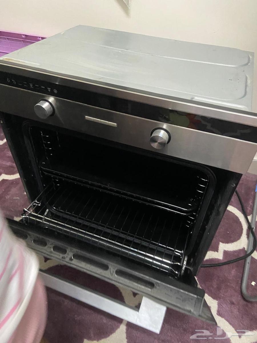 Almost new microwave and electric oven without any defects64442529571841111