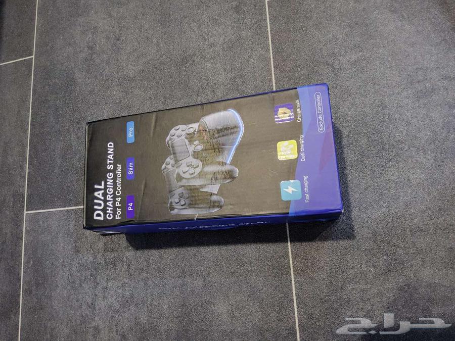 ستاند وشاحن سوني 4 جديد64452279478914110