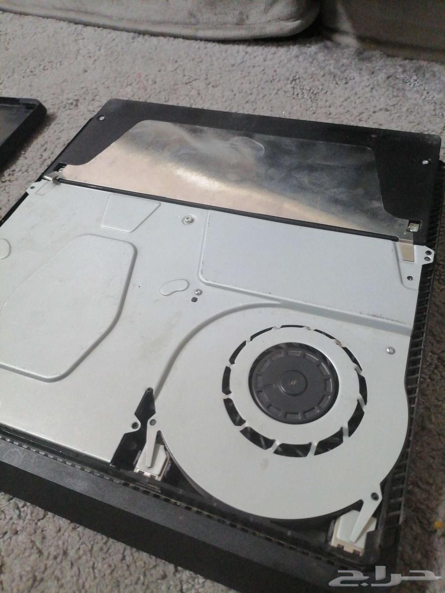 PlayStation 4 with 2 controllers, charger, cables, and tapes64454936447617111