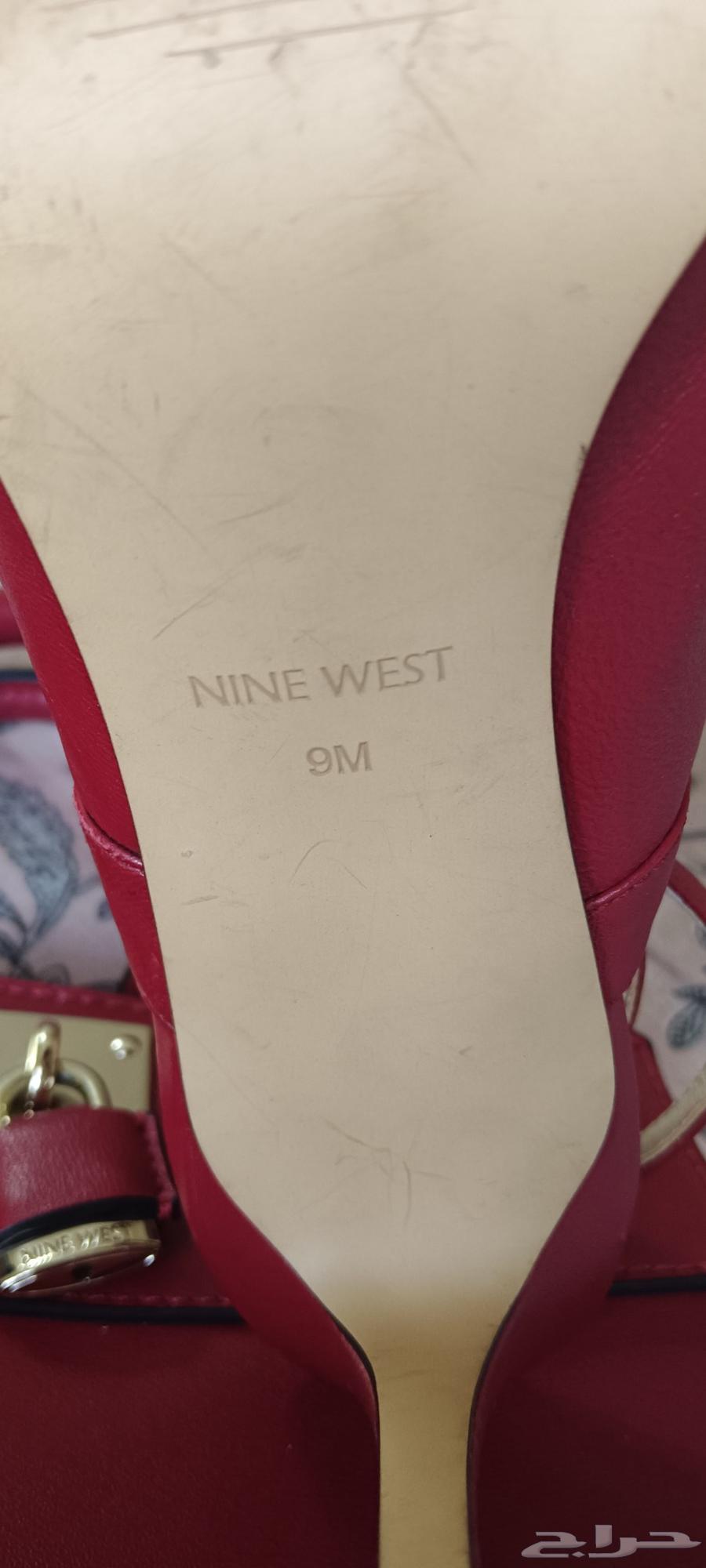 Three bags and one shoe, one of which is new and unused with a bride's hand fan64453421341057112