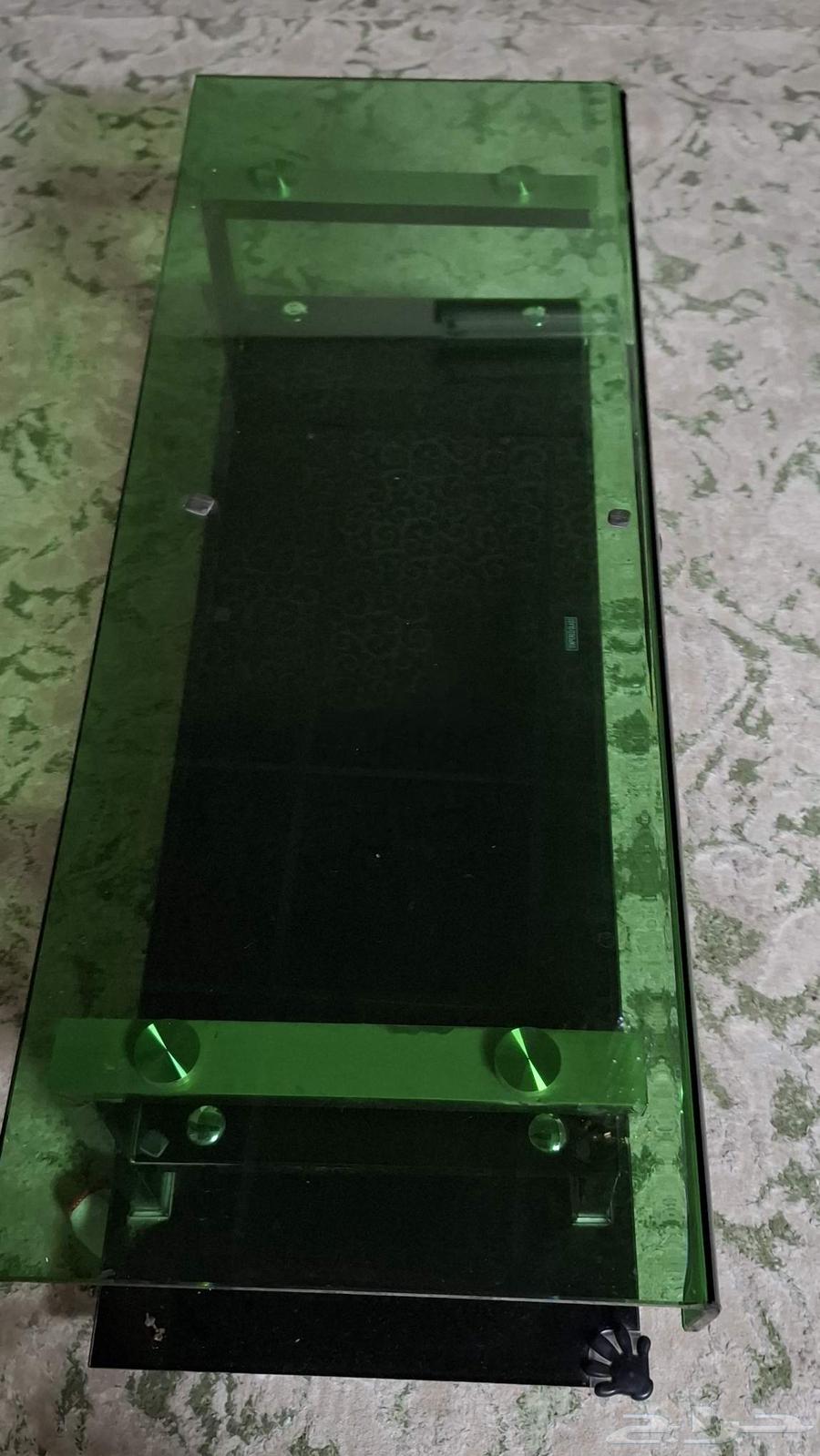 طاولة قزاز سميك مع قاعدة حديدية64464336841091110